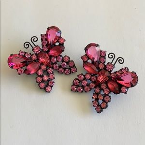 Two vintage Weiss butterfly brooches.